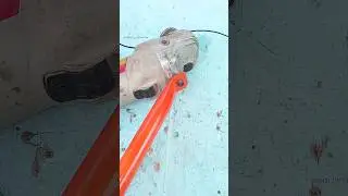 DIY grass trimmer using an angle grinder 