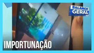 Homem grava as partes íntimas de uma mulher com celular no elevador