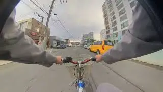 Im riding my bike past Samushil to my friends.