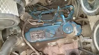 3 cylinder Kubota diesel motor fuel injector removal and replacement.