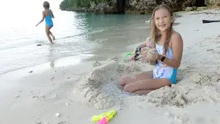 Children playing on the beach 4K