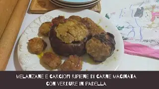 aubergines and artichokes stuffed with minced meat and vegetables in a pan pan-fried
