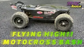TRAXXAS SLEDGE XL (M2C JACKHAMMR) RIPS UP THE MOTOCROSS TRACK.
