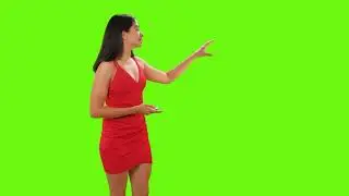 Weather presenter giving newsroom presentation on a green screen