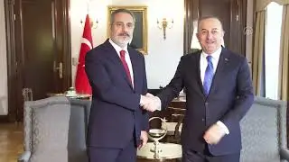 Hakan Fidan and Mevlüt Cavusoglu came together for the handover ceremony