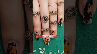 Unique black and orange marble nail art design trick 
