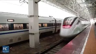 High-speed commuter train service launched in south Chinas tropical city HD