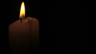 Заставка на видео, горящая свеча
