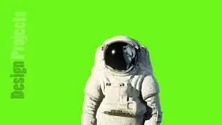 An astronaut on the moon next to his moon rover watching the Earth. Green screen