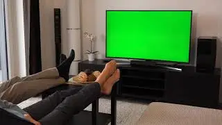 Green Screen | Chroma Key | A couple watches tv with green screen with legs on table | 4K | HD