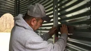 Installing Metal framing for bottom level of Grain Bin House  E15