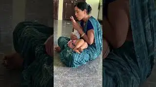 baby feeding mother milk with father help