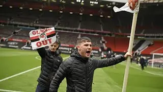 Manchester United fans break onto Old Trafford pitch in anti-Glazers protest