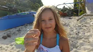 Children playing on the beach. September 2021 on the Philippines. 4k