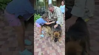 The huge German Shepherd Argun and his beloved owners.