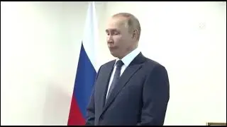 Putin's long wait. Sound on, please.