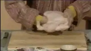 Delia Smith tries to stuff a chicken