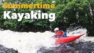 Summer whitewater kayaking on the Tryweryn