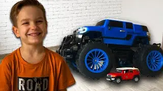 Mark plays with toddler cars and toy trucks
