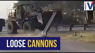 WATCH: Richards Bay protesters use heavy duty front loaders to flip police cars
