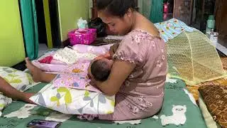 Ibu muda cantik gemoy menyusui bayi