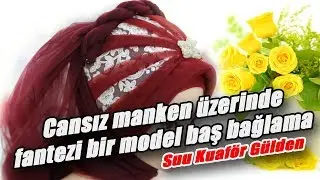 Cansız manken üzerinde fantezi bir baş bağlama