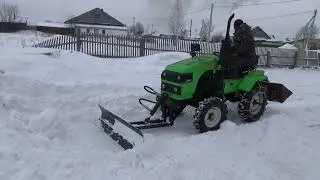 Уборка снега с отвалом на минитракторе Рустрак Р-18