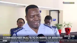 National Police Commissioner Fannie Masemola reacts to robing of minister