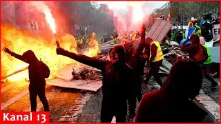 Protesters march in Paris on the 10th day of nationwide strikes