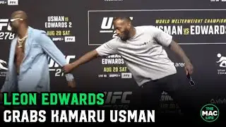 Leon Edwards grabs Kamaru Usman’s arm at UFC 278 face offs