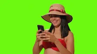 Girl in beachwear takes a selfie on green screen   Free Stock Video