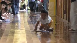 Japanese Village Turns Floor Wiping Into A Race