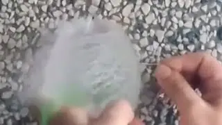 Bursting a water balloon in slow motion at 480 FPS  #shorts