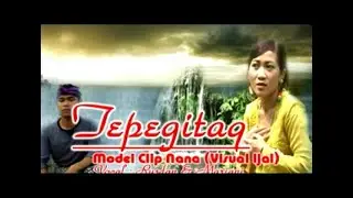 Tepegitaq. Vocal: Rusdan ft Baiq Mariani. Model Klip: Nana