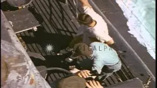 Men on bridge and conning tower of U.S. submarine underway in the Pacific Ocean. HD Stock Footage