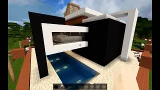 First Minecraft Modern House with a pool, a garage and a train station below