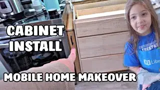 Installing Our First New Cabinet After Replacing the Floor in Mobile Home