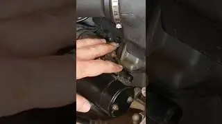 Safely use a wrench on your BMW R1150 starter.