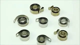 Variable Force Spring for Shelf Pusher