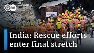 Indian rescuers reach 41 workers trapped in tunnel | DW News