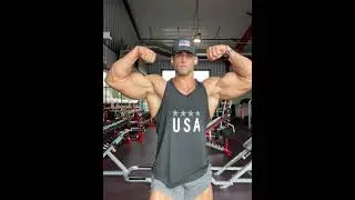bodybuilder / showing his flex pumped muscle 