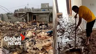 Life is non-existent: Libya flood survivors walk through destroyed homes