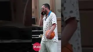 Adam Sandler Talks On The Phone While Carrying A Basketball After Shooting Hoops In New York City