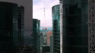 Air lifting a $3million McLaren Senna GTR into a $39millon penthouse