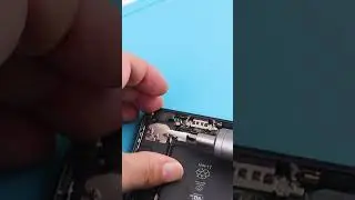 remove the battery tape by electric screwdriver