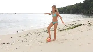 Children playing on the beach with ball 4k