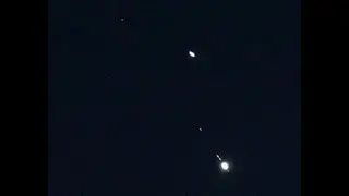 Starlink 1132 satellite flies in between the 2020 Saturn/Jupiter Conjunction