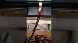 Печать текста на красной ленте