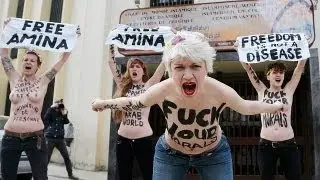 Femen targets Islam in bare-breast Brussels protest