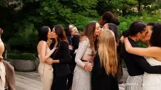 Lesbian couples kissing in group